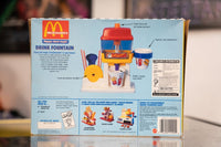Mattel 1993 McDonald's drink fountain toy in original sealed box, showing colorful plastic dispenser with red and yellow accents
