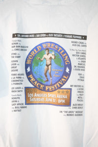 1996 World Wrestling Peace Festival t-shirt, size large, featuring printed graphic on front in navy blue cotton