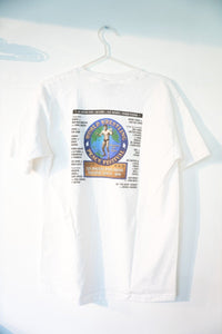 1996 World Wrestling Peace Festival shirt in large size, featuring printed graphic on front of navy blue cotton tee