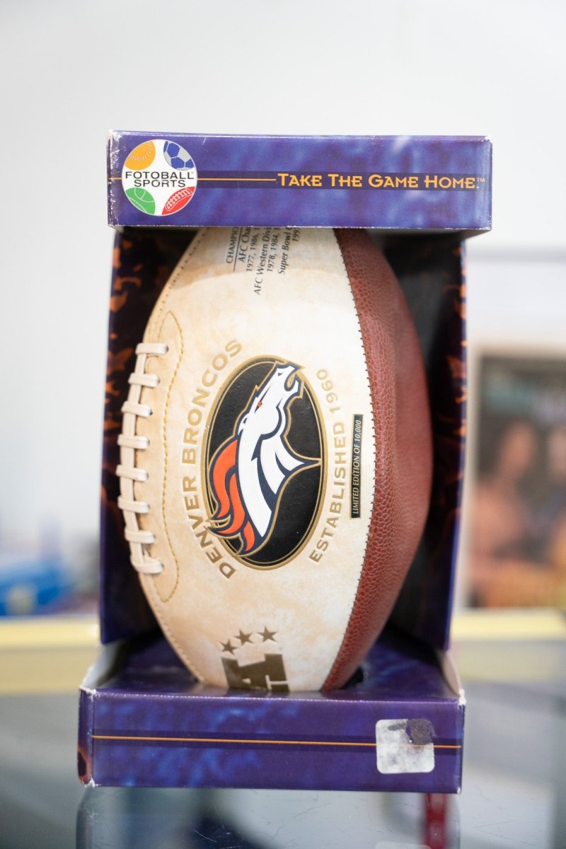1997 Denver Broncos limited edition commemorative football by Fotoball Sports in original purple display box with Broncos logo