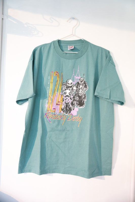 Sage green 1998 124th Kentucky Derby tee with gold 124 numerals racing horses jockeys Churchill Downs twin spires lavender gold Kentucky Derby script size XL