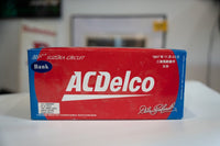 NASCAR Action Diecast 1/24 scale die-cast bank featuring #3 AC Delco race car livery from 1997, metallic finish with detailed racing graphics and Suzuka Circuit branding on collectible toy vehicle