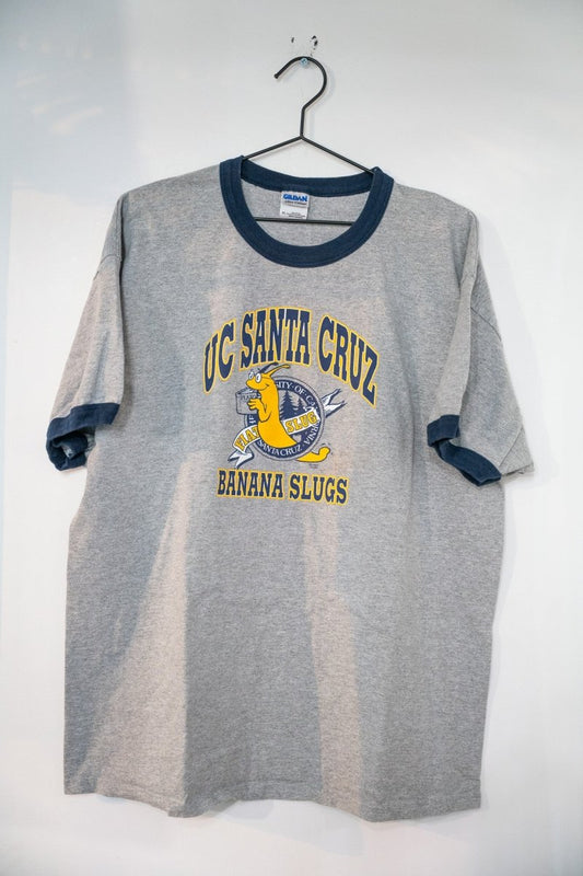 Heather gray UC Santa Cruz Banana Slugs ringer t-shirt with navy collar and cuffs yellow slug mascot and navy UC SANTA CRUZ lettering size XL