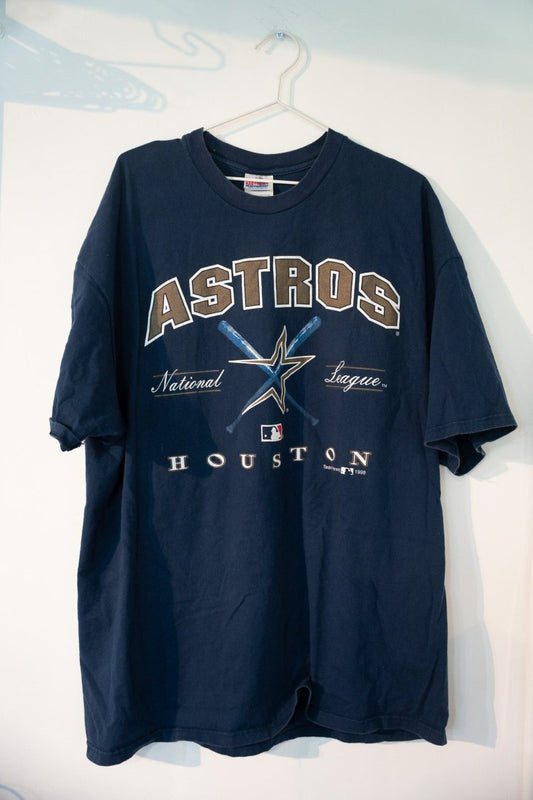 Dark navy 1998 Houston Astros baseball tee with gold ASTROS arch shooting star logo crossed bats National League HOUSTON text size XXXL