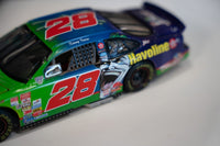 DC Comics 1998 Joker Kenny Irwin 1:24 scale diecast car, purple and green paint with character graphics on white display card