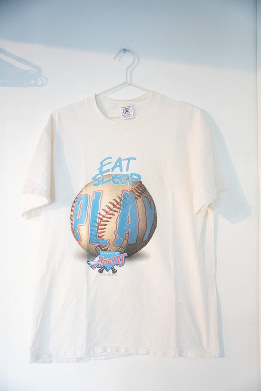 White cream 1999 Anaheim Angels Eat Sleep Play tee with photorealistic baseball graphic light blue text winged A logo size Large
