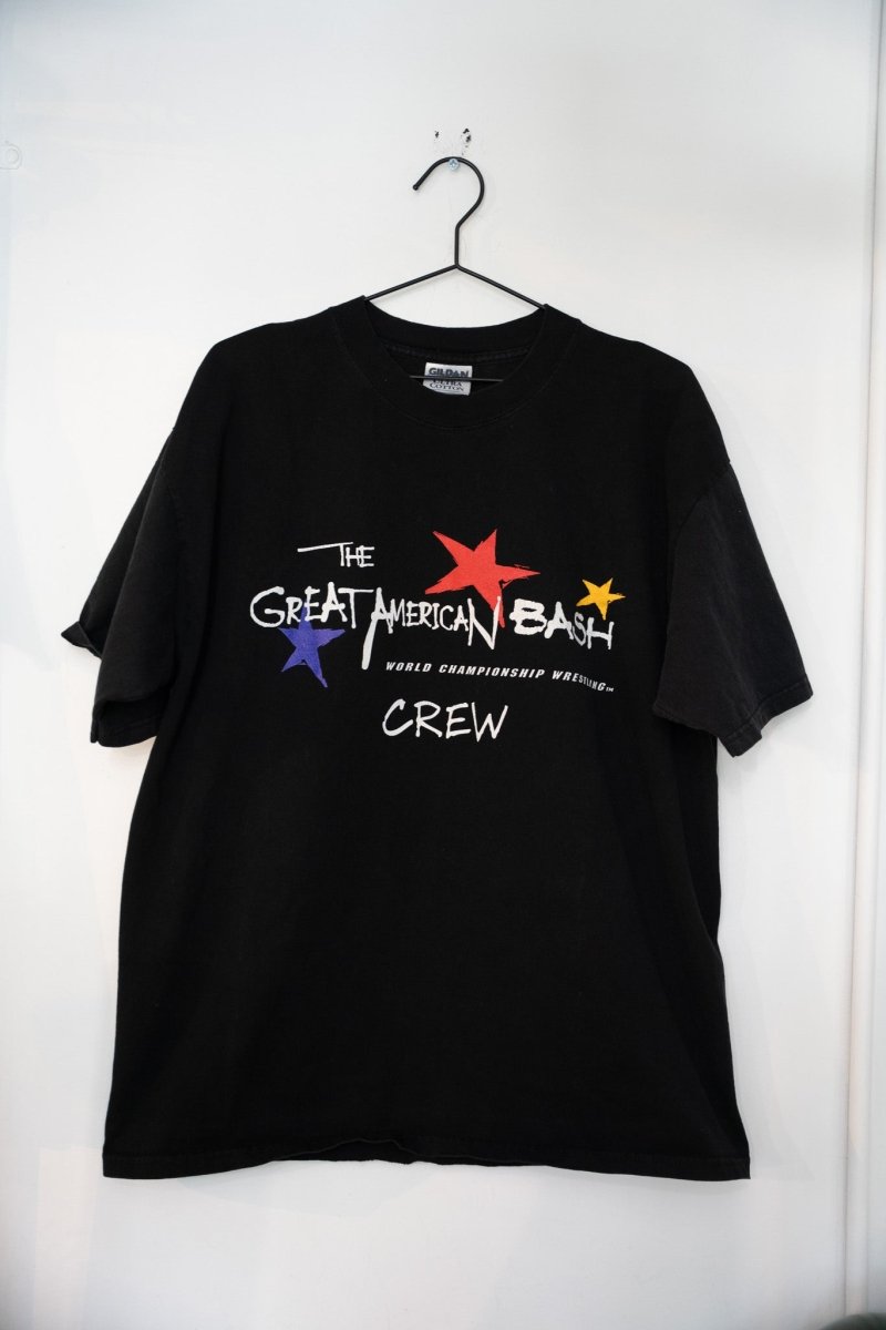 WCW The Great American Bash crew t-shirt from 1999, size XL, featuring printed wrestling event graphics on navy cotton fabric