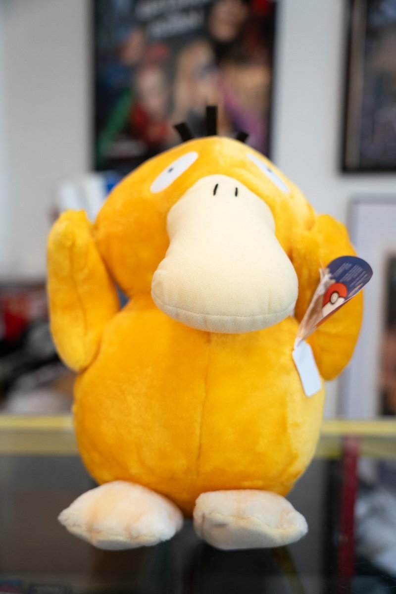 Yellow 2000 Psyduck 12 inch Pokemon plush with hands on head white blank eyes cream bill and original Pokemon hang tag NWT