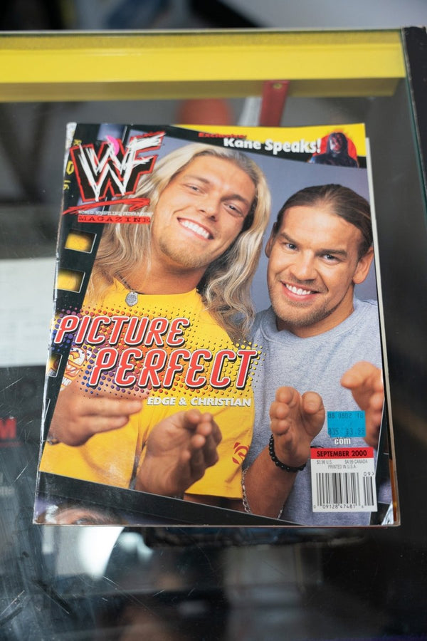 2000 WWF Magazine September issue Edge and Christian Picture Perfect cover Edge blonde hair yellow shirt Christian blue shirt Kane Speaks headline