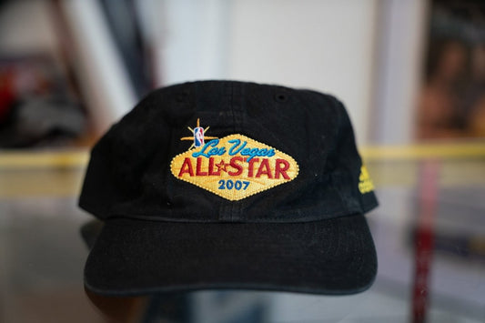 Black 2007 NBA All-Star Game Adidas hat with gold diamond Las Vegas-inspired embroidered logo and NBA logo on front