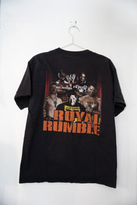 WWE 2011 Royal Rumble event t-shirt in size large, featuring John Cena and Randy Orton graphics printed on dark fabric