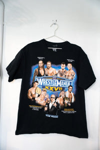 WWE Wrestlemania XXVII 2011 graphic t-shirt in large size, featuring event branding and wrestling imagery printed on dark fabric