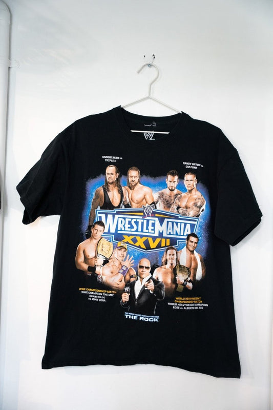 WWE Wrestlemania XXVII 2011 graphic t-shirt in large size, featuring event branding and wrestling imagery printed on dark fabric