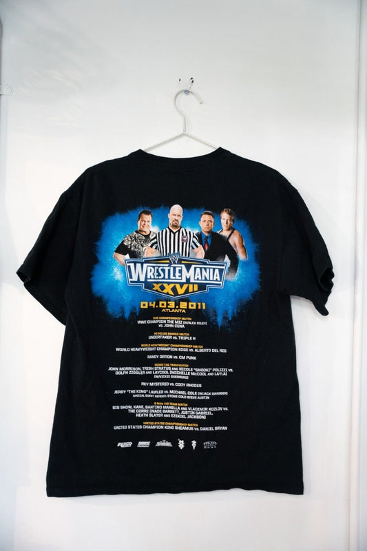 WWE Wrestlemania XXVII 2011 t-shirt in size large, displaying event graphics and wrestling imagery on gray fabric