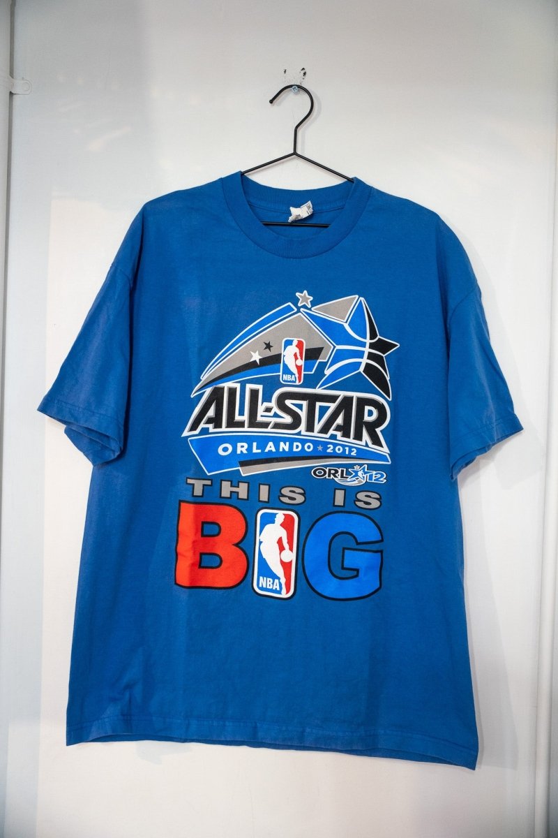 Blue 2012 NBA All-Star Game Orlando t-shirt with star logo ALL-STAR lettering ORL 12 badge and THIS IS BIG in red and blue block letters size XL