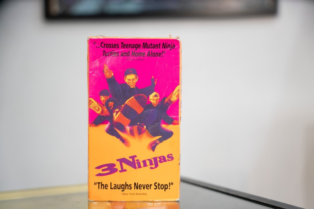 3 Ninjas VHS hot pink orange sleeve three boys in ninja outfits flying kicks purple 3 Ninjas script TMNT Home Alone quote Laughs Never Stop