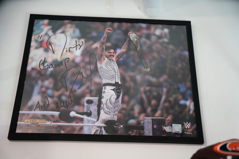Dominik Mysterio WWE Autographed 16" x 20" WrestleMania 41 Raising Title Photograph with "And New" Inscription 11/50