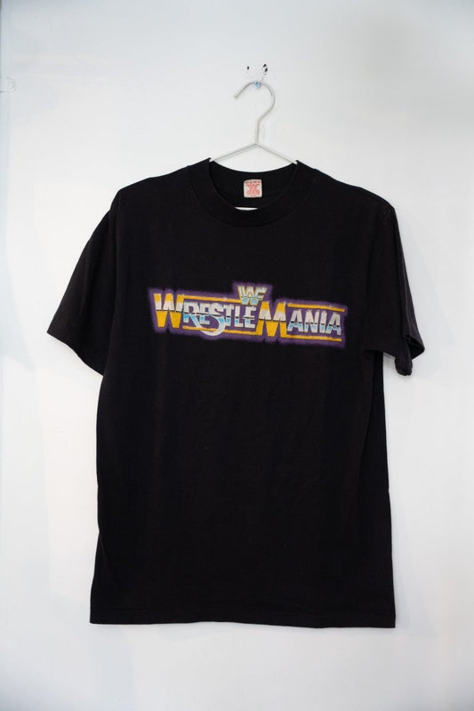 WWF Wrestlemania logo collegiate Pacific t-shirt from the 1980s, featuring printed graphics on heather gray fabric, size large