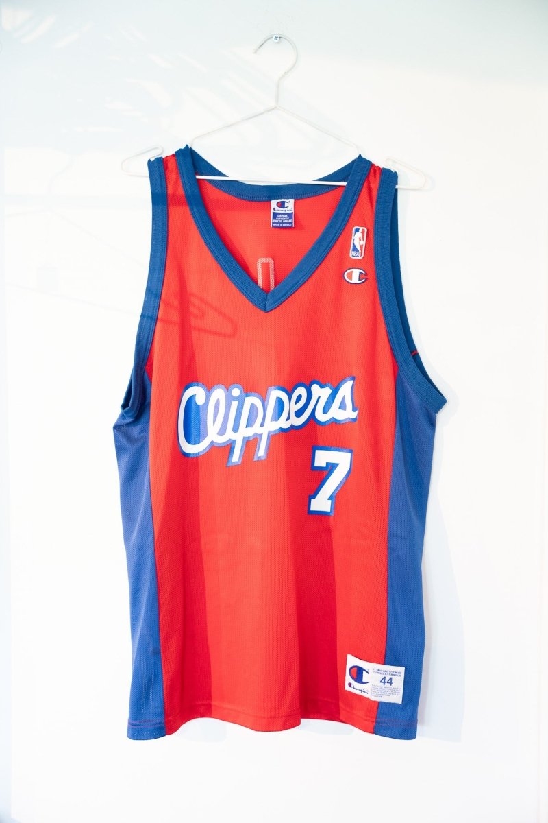 Red 90s Champion Los Angeles Clippers Lamar Odom 7 basketball jersey white script Clippers text blue trim side panels mesh size Large 44