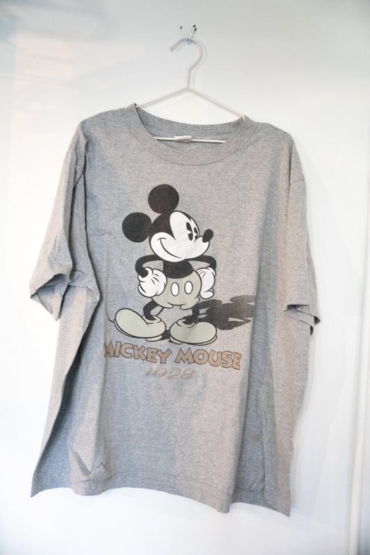 Heather gray 90s Disney Mickey Mouse 1928 shirt with large sepia-toned classic Mickey Mouse graphic and vintage block lettering
