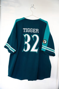 Disney Tigger baseball jersey in Seattle Mariners style, orange and navy striped design with character graphic, 1990s, size XL