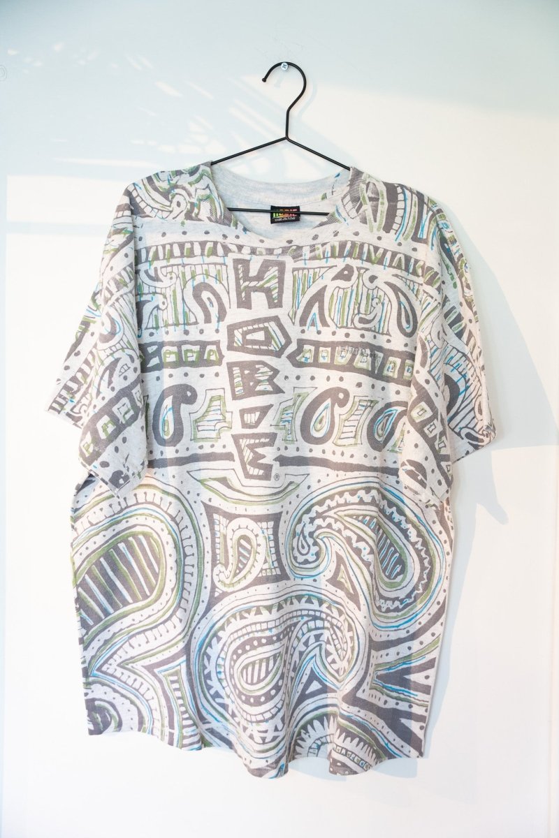Heather gray 90s Hobie Design all-over-print tee with tribal surf paisley swirl abstract pattern blue green olive tones size XL