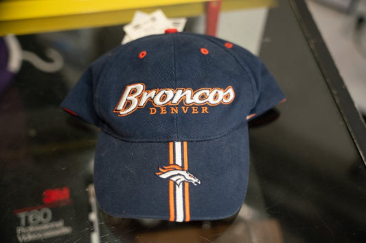 Navy 90s NFL GameDay Denver Broncos velcro hat with Broncos script, horse head logo, and orange and white racing stripes
