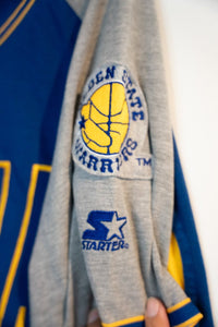 Starter Golden State Warriors baseball jersey in royal blue and gold with embroidered logo, 1990s style, size large displayed flat