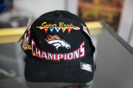 Denver Broncos Super Bowl XXXII Champions black locker room hat with original tags, gold Super Bowl script, and CHAMPIONS embroidery