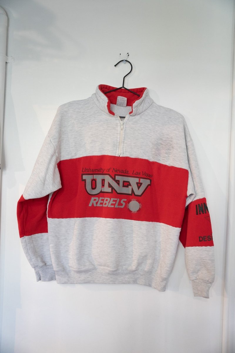 Heather gray 90s UNLV Runnin Rebels quarter-zip sweater with red chest band and UNLV Rebels logo with basketball graphic size Large