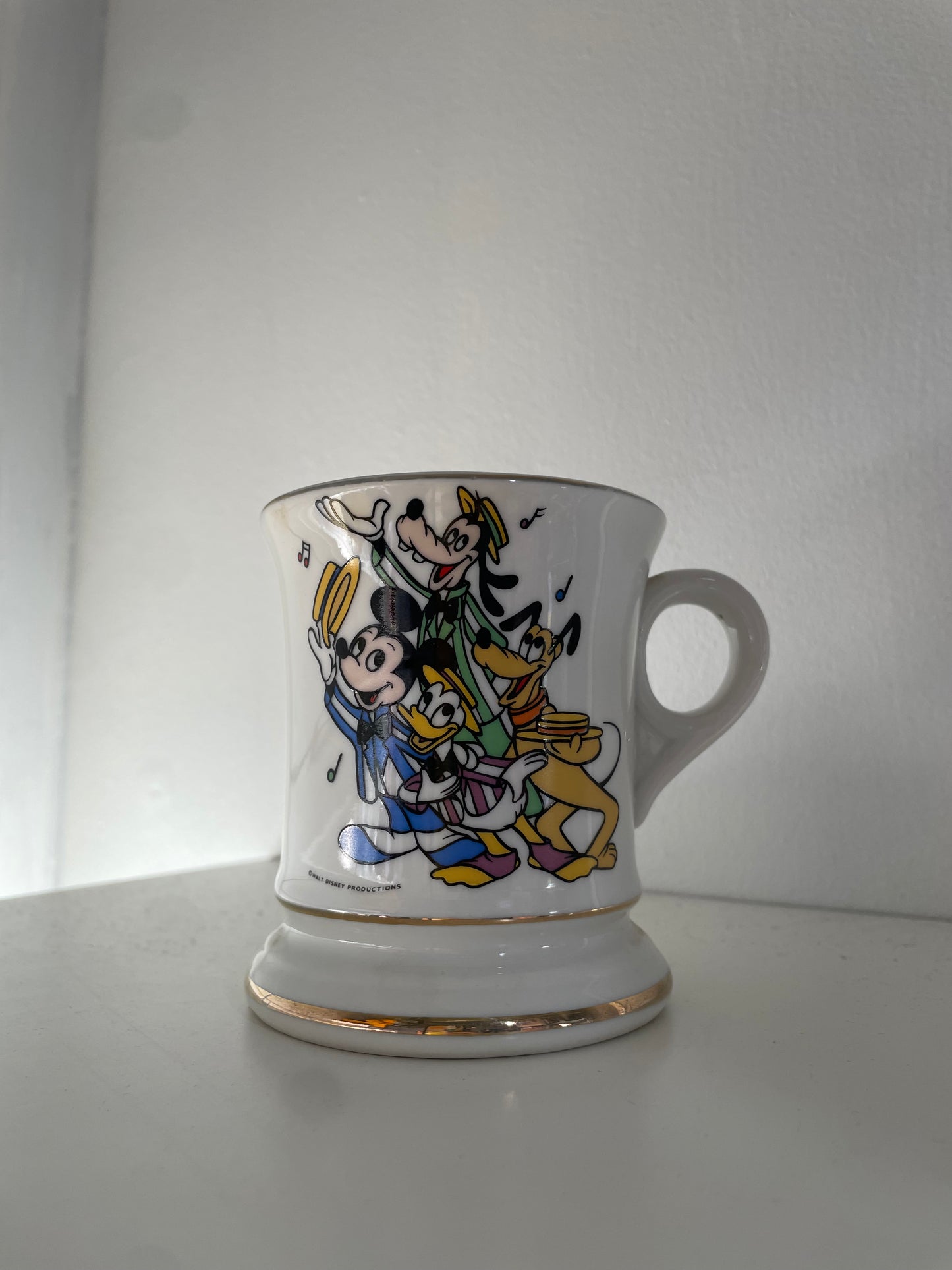 Taza del Cuarteto de Barbería de Mickey y sus amigos