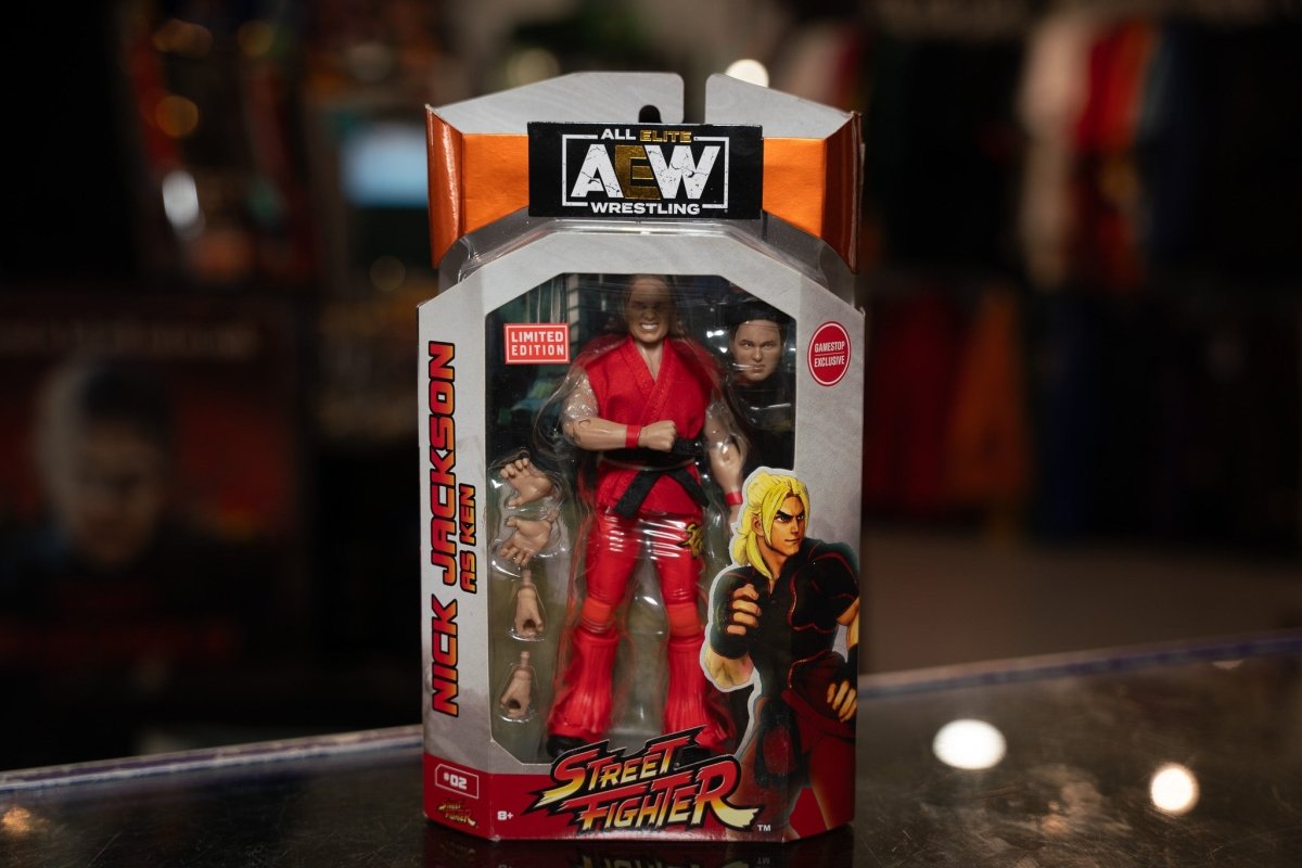 AEW Nick Jackson As Ken Street Fighter limited edition action figure with blonde hair, white gi, and red headband