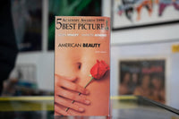 DreamWorks American Beauty VHS box featuring dark cover art with red rose petals, 1999 film