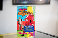 Austin Powers The Spy Who Shagged Me VHS colorful panels Mike Myers red velvet suit Heather Graham Dr Evil Mini-Me pink retro title