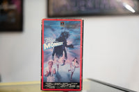 Blue Monkey VHS red-bordered sleeve with giant insect creature above two women running blue white energy backdrop and RCA Columbia Pictures Home Video