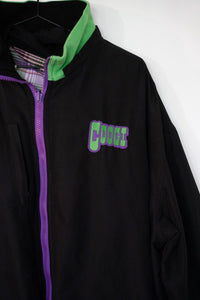 Coogi reversible plaid hoodie windbreaker jacket in size 4XL, Y2K era, featuring logo details and zip closure displayed on flat lay surface