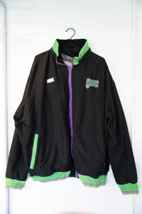 Black Coogi reversible windbreaker jacket with green purple accents embroidered COOGI logo green ribbed trim purple zipper plaid lining size 4XL