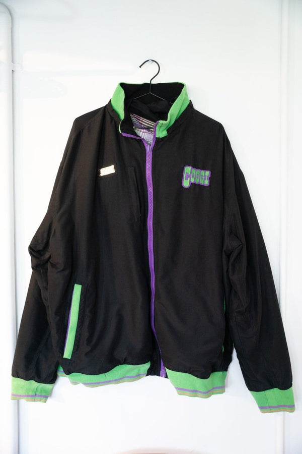 Black Coogi reversible windbreaker jacket with green purple accents embroidered COOGI logo green ribbed trim purple zipper plaid lining size 4XL
