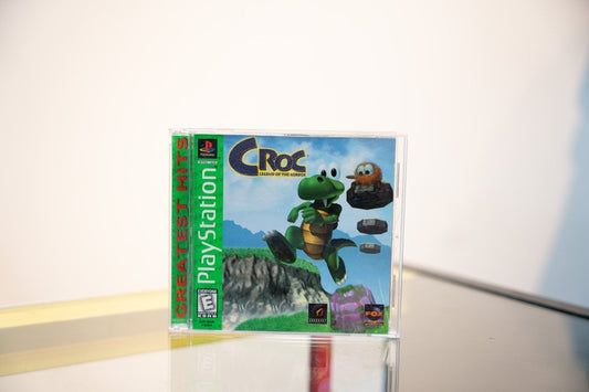 PlayStation Croc Legend of the Gobbos green Greatest Hits jewel case Croc green crocodile leaping orange Gobbo CROC blue text Fox Interactive