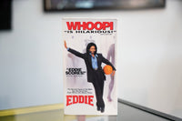 Eddie VHS white sleeve with large red WHOOPI text Whoopi Goldberg in black suit holding basketball Knicks coaching tagline red EDDIE title