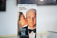Father of the Bride VHS with Steve Martin in tuxedo daughter kissing cheek in wedding veil elegant title and People Magazine quote