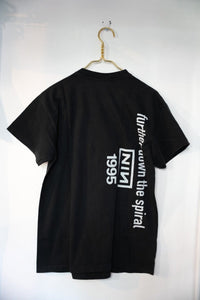 Giant Nine Inch Nails band t-shirt, size large, featuring black graphic print on dark fabric