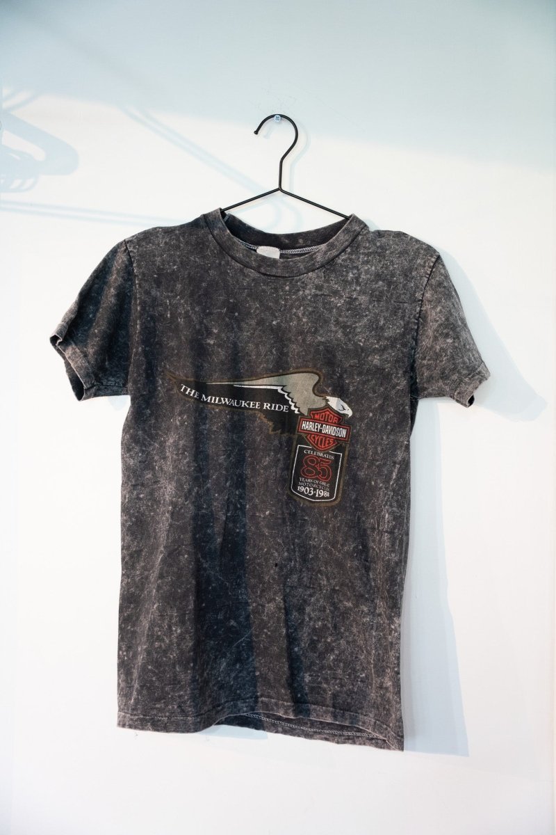 Black acid-wash Harley-Davidson 85th Anniversary The Milwaukee Ride tee with eagle bar-and-shield logo 1903-1988 anniversary badge size Medium