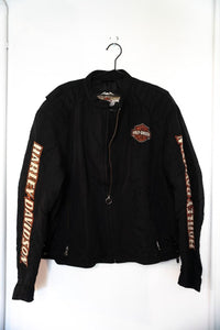 Black Harley-Davidson motorcycle riding jacket with Bar and Shield chest logo orange HARLEY-DAVIDSON sleeve lettering and padded shoulders size XXL