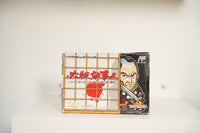 Nintendo Famicom Hissatsu Shigotonin box shoji screen blood splatter chibi samurai blade Japanese kanji red text Banpresto Famicom Family logo