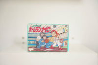 Nintendo Famicom Homerun Nighter box teal border cartoon batter red uniform catcher stadium PENNANT LEAGUE banner Homerun Nighter katakana DECO logo