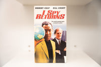 VHS I Spy Returns Robert Culp dark suit Bill Cosby yellow plaid jacket globe skyline I SPY RETURNS red text world's greatest spies