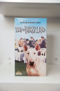 VHS It's a Dog's Life blue sky cover MGM white Bull Terrier dog show scene 1950s spectators It's a DOG'S Life text MGM UA Home Video