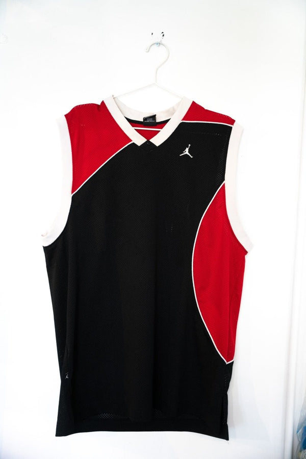 Black and red Jordan Brand mesh basketball jersey with curved diagonal panels white piping and embroidered Jumpman logo size L