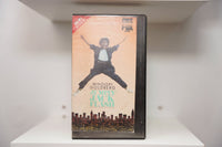 VHS Jumpin' Jack Flash Whoopi Goldberg jumping arms spread dark outfit white sneakers NYC skyline JUMPIN JACK FLASH teal text CBS Fox Hi-Fi